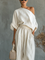 Rebecca | Conjunto de Lino Blanco Roto con Top de Hombros Descubiertos y Pantalón Cónico